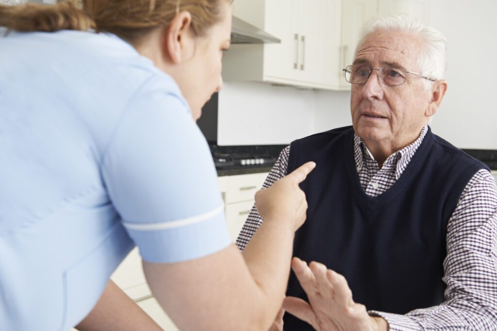Nursing Home Abuse: Care Worker Mistreating Elderly Man