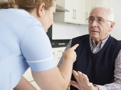 Nursing Home Abuse: Care Worker Mistreating Elderly Man